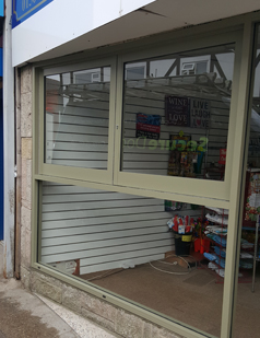 Shop front shutters fitted by SDG UK